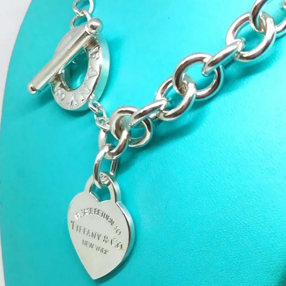 Tiffany & Co. Silver Heart Tag Toggle Necklace on Blue